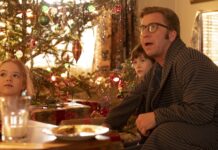 A Christmas Story Christmas: Sequel to classic holiday movie Peter Billingsley plays Ralphie, a father, sitting near a brightly-lit Christmas Tree with his young son and daughter.