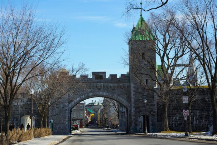Picture of the gates to the Old Town of Quebec City. It remains the only completely garrison-walled city north of Mexico.