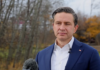 Disinformation pipeline: Poilievre’s false claims travel from Ottawa to Washington Pierre Poilievre stands outdoors in front of a microphone at a media interview.