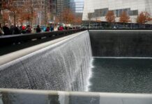 Deeply moving 9/11 Memorial at World Trade Center site Sideways view of a waterfall at the 9/11 Memorial in downtown Manhattan, at the siter of the former World Trade Center.